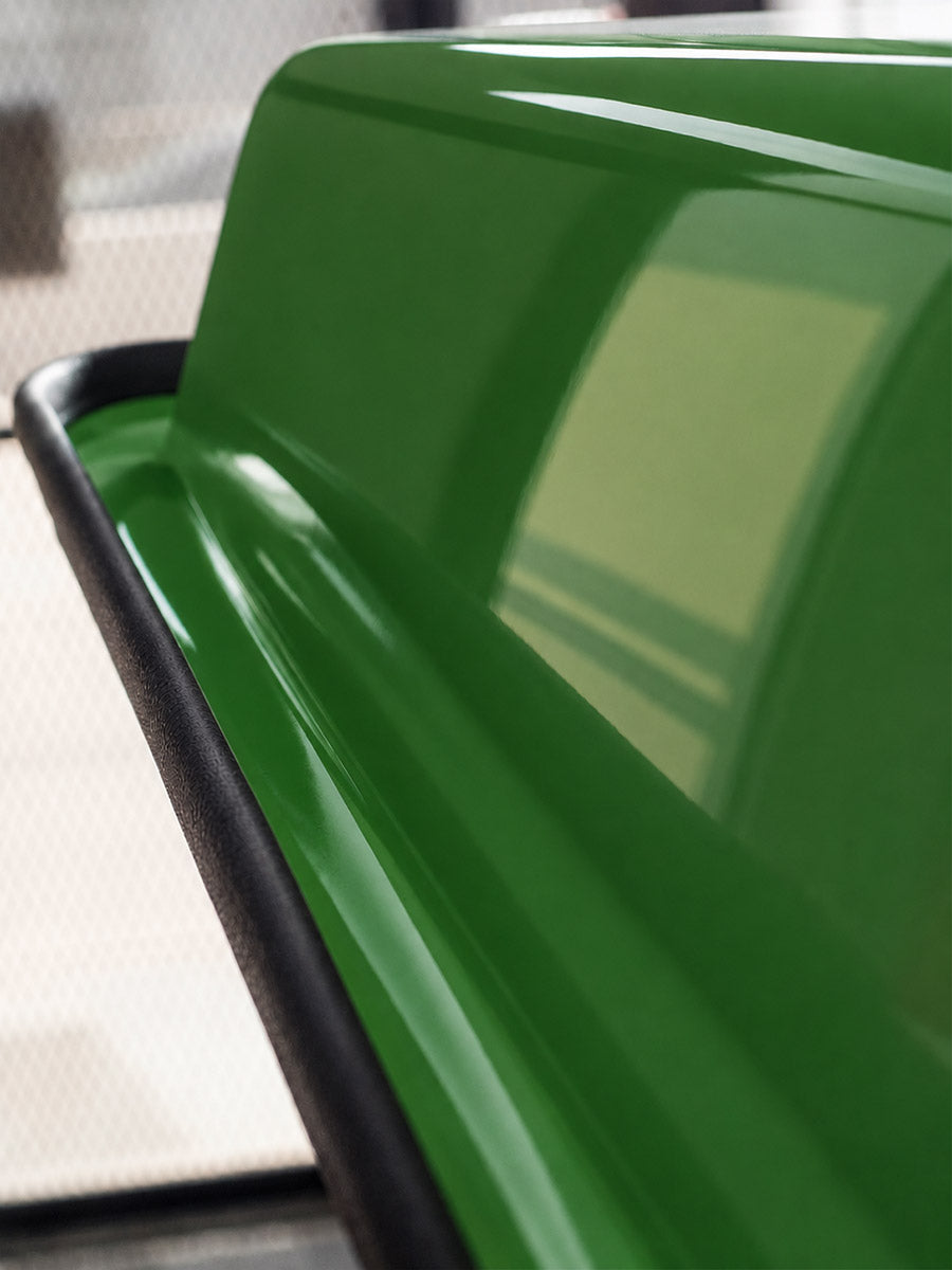 Close-up detail of the molded rain gutter and glossy green finish on a Tractor Sunshade D3 Legacy canopy.