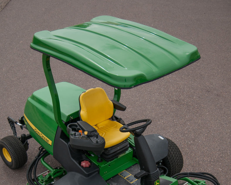 John Deere zero-turn mower equipped with a green Tractor Sunshade N1 N-Series fiberglass canopy.